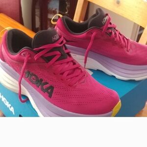 Hoka Pink and Black Athletic Shoes with Maximalist Cushioning
